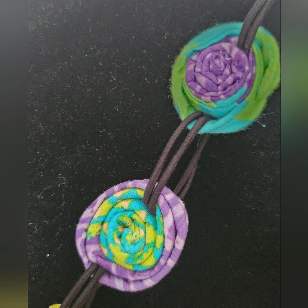 Multi colored coiled fabric necklace